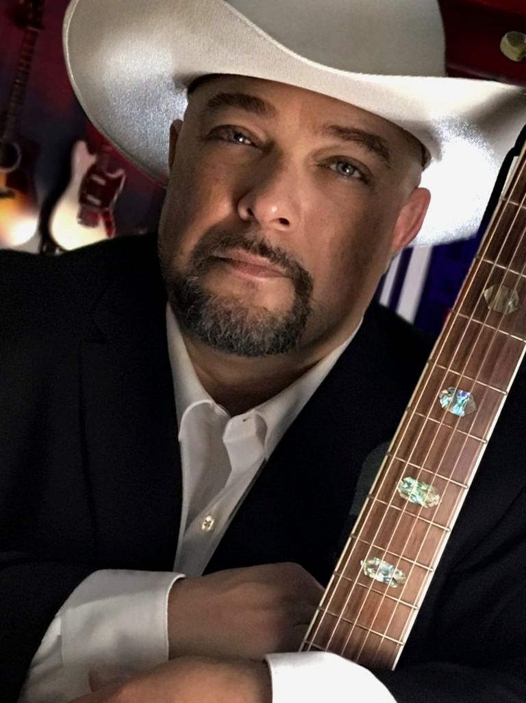 Manny in the studio recording his EP, "MRS.H!?"